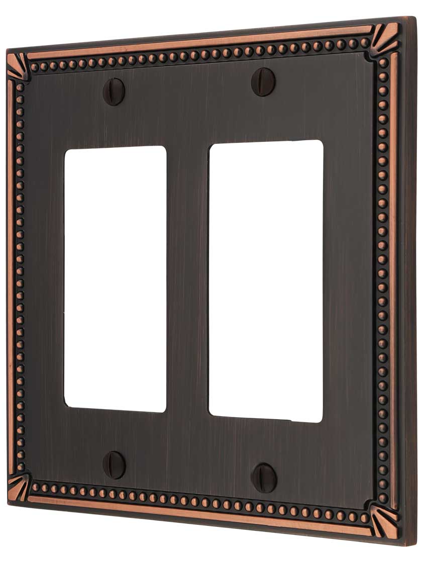 Imperial Bead Double GFI Cover Plate in Aged Bronze.